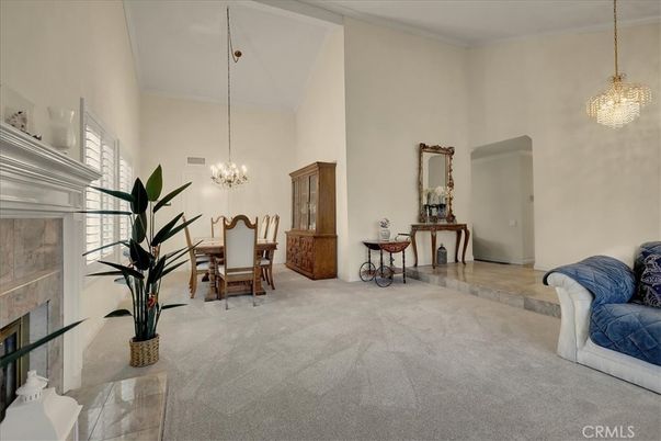 Chandelier, Dining room, Fireplace, Interior, Pendant Lights