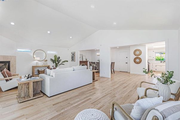 Dining room, Fireplace, Interior, Living room, Pendant Lights, Recessed Lighting, Wood Texture Flooring