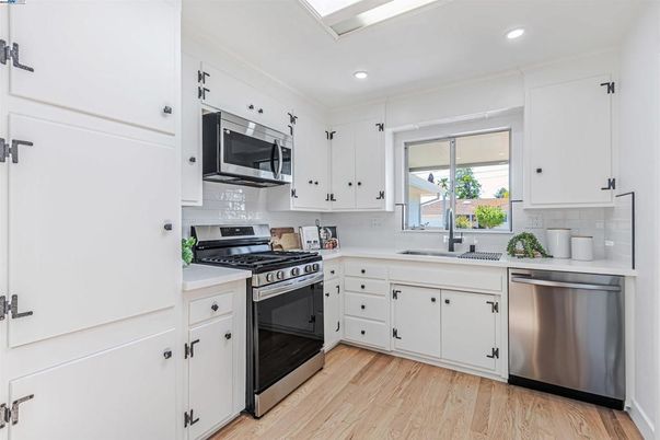 Interior, Kitchen, Recessed Lighting, Stainless Steel Appliances, Wood Texture Flooring