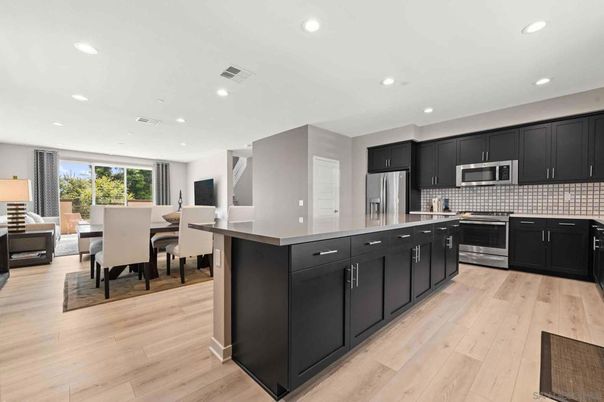 Dining room, Interior, Kitchen, Recessed Lighting, Stainless Steel Appliances, Wood Texture Flooring