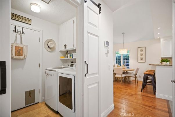 Dining room, Interior, Pendant Lights, Recessed Lighting, Washer, Wood Texture Flooring