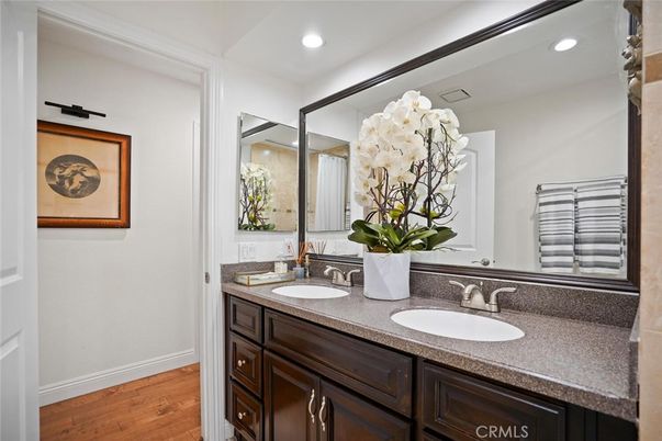Bathroom, Dual Sink Vanities, Interior, Recessed Lighting, Wood Texture Flooring