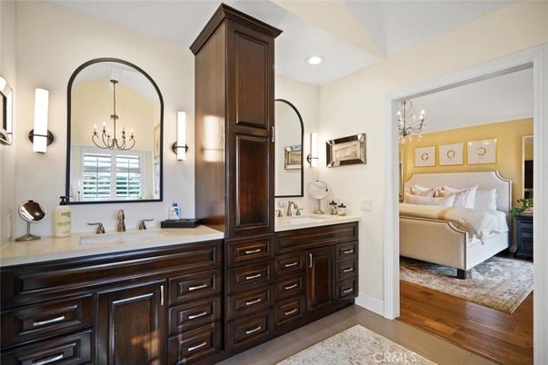 Bathroom, Bedroom, Chandelier, Dual Sink Vanities, Interior, Recessed Lighting, Wood Texture Flooring