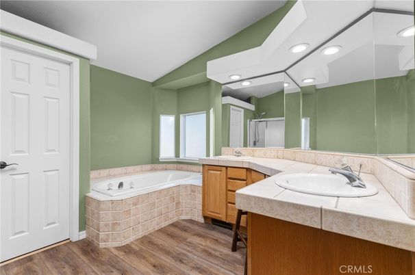 Bathroom, Dual Sink Vanities, Interior, Recessed Lighting, Tile Countertops, Wood Texture Flooring