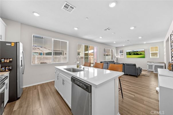 Dining room, Interior, Kitchen, Recessed Lighting, Stainless Steel Appliances, Wood Texture Flooring