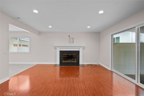 Empty room, Fireplace, Interior, Recessed Lighting, Wood Texture Flooring