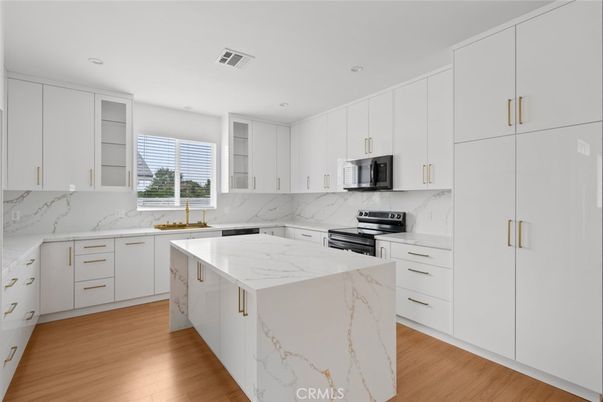 Interior, Kitchen, Marble Walls, Recessed Lighting, Wood Texture Flooring