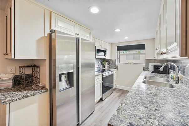 Interior, Kitchen, Recessed Lighting, Stainless Steel Appliances, Wood Texture Flooring