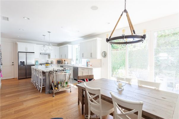 Dining room, Interior, Kitchen, Pendant Lights, Recessed Lighting, Stainless Steel Appliances, Wood Texture Flooring