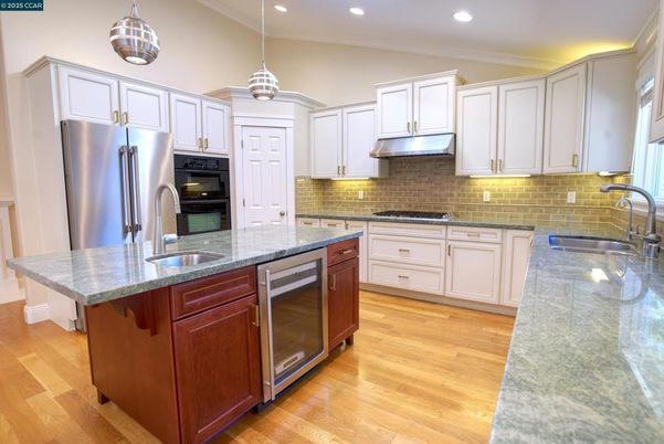 Interior, Kitchen, Pendant Lights, Recessed Lighting, Stainless Steel Appliances, Wood Texture Flooring