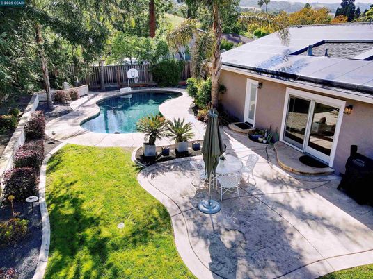 Exterior, Pool, Solar Panels