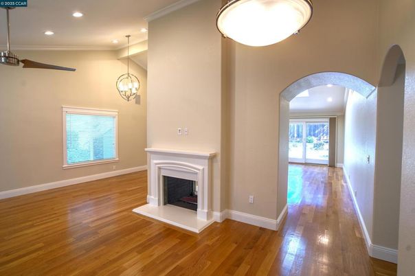 Fireplace, Interior, Pendant Lights, Recessed Lighting, Wood Texture Flooring
