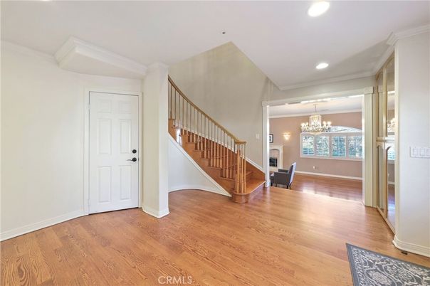 Chandelier, Empty room, Fireplace, Interior, Recessed Lighting, Wood Texture Flooring