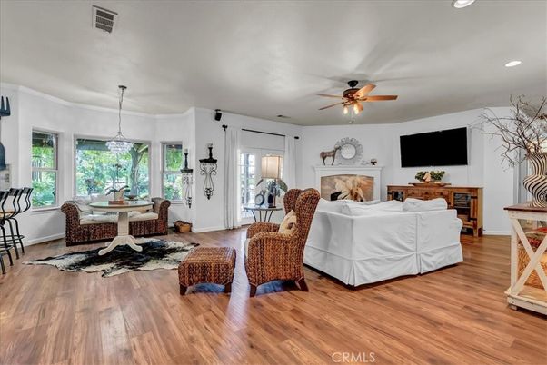 Dining room, Fireplace, Interior, Living room, Pendant Lights, Recessed Lighting, Wood Texture Flooring