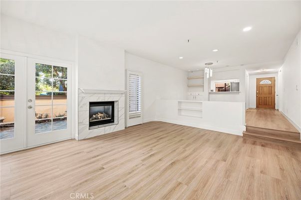 Empty room, Fireplace, Interior, Recessed Lighting, Wood Texture Flooring