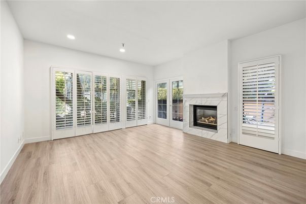 Empty room, Fireplace, Interior, Recessed Lighting, Wood Texture Flooring