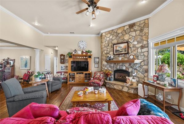 Fireplace, Interior, Living room, Recessed Lighting, Stone Walls, Wood Texture Flooring