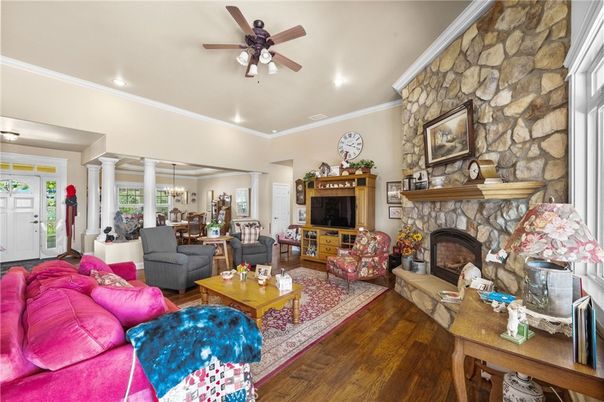 Chandelier, Dining room, Fireplace, Interior, Living room, Recessed Lighting, Stone Walls, Wood Texture Flooring
