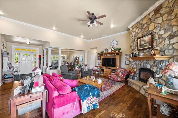 Chandelier, Dining room, Fireplace, Interior, Living room, Recessed Lighting, Stone Walls, Wood Texture Flooring