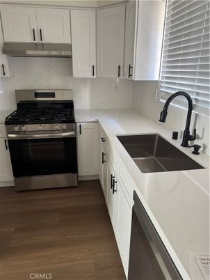 Interior, Kitchen, Marble Walls, Stainless Steel Appliances, Wood Texture Flooring