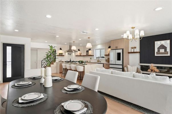 Chandelier, Dining room, Interior, Kitchen, Living room, Pendant Lights, Recessed Lighting, Stainless Steel Appliances, Wood Texture Flooring