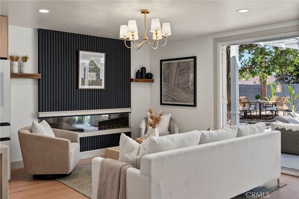 Chandelier, Dining room, Fireplace, Interior, Living room, Recessed Lighting, Wood Texture Flooring