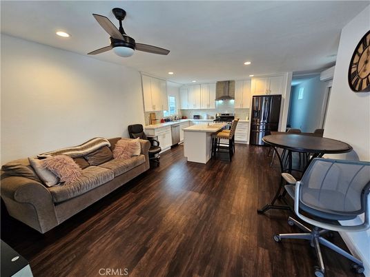 Dining room, Interior, Kitchen, Living room, Recessed Lighting, Stainless Steel Appliances, Wood Texture Flooring
