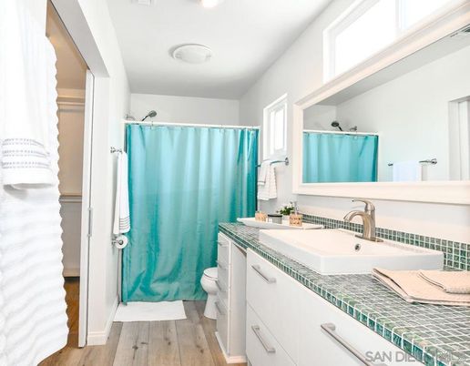Bathroom, Interior, Recessed Lighting, Tile Countertops, Wood Texture Flooring