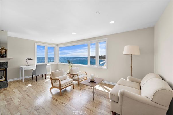 Fireplace, Home Office, Interior, Living room, Recessed Lighting, Water, Wood Texture Flooring