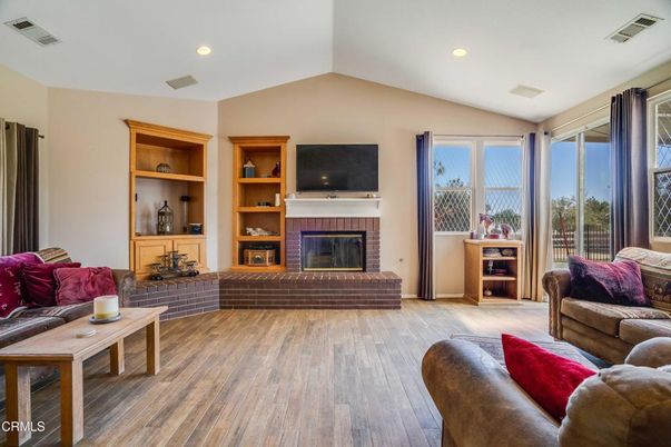 Fireplace, Interior, Living room, Recessed Lighting, Wood Texture Flooring