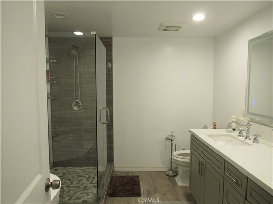 Bathroom, Glass Shower, Interior, Recessed Lighting, Wood Texture Flooring