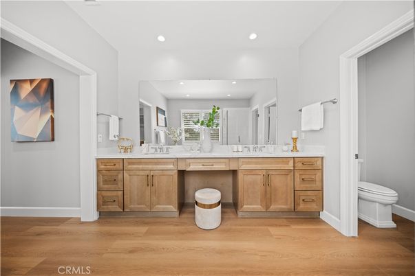 Bathroom, Dual Sink Vanities, Interior, Recessed Lighting, Wood Texture Flooring