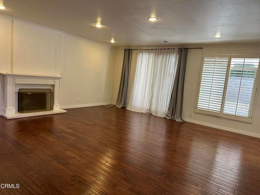 Empty room, Fireplace, Interior, Recessed Lighting, Wood Texture Flooring
