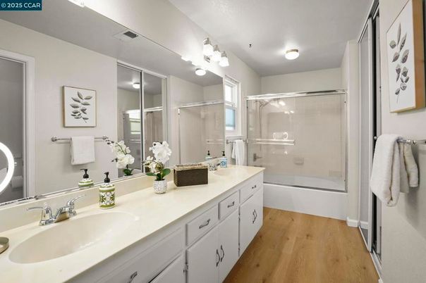 Bathroom, Dual Sink Vanities, Glass Shower, Interior, Wood Texture Flooring