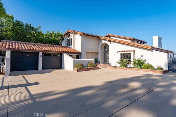 Attached, Exterior, Facade, Spanish Mediterranean
