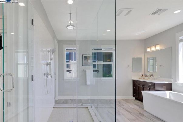 Bathroom, Free Standing Baths, Glass Shower, Interior, Pendant Lights, Recessed Lighting, Wood Texture Flooring