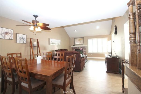 Dining room, Fireplace, Interior, Living room, Recessed Lighting, Wood Texture Flooring