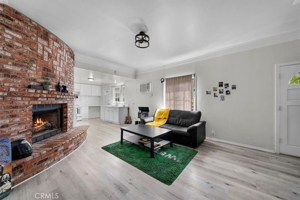 Fireplace, Interior, Living room, Pendant Lights, Stone Walls, Wood Texture Flooring