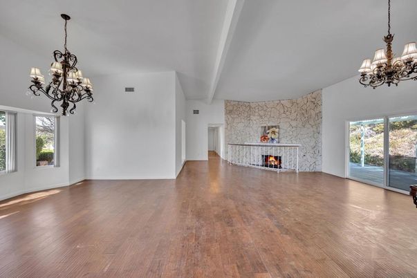 Chandelier, Empty room, Fireplace, Interior, Stone Walls, Wood Texture Flooring