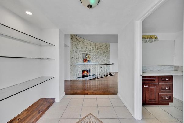 Fireplace, Interior, Recessed Lighting, Stone Walls, Wood Texture Flooring