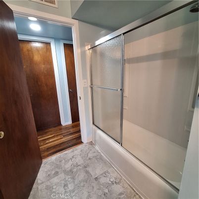 Bathroom, Glass Shower, Interior, Marble, Recessed Lighting, Wood Texture Flooring