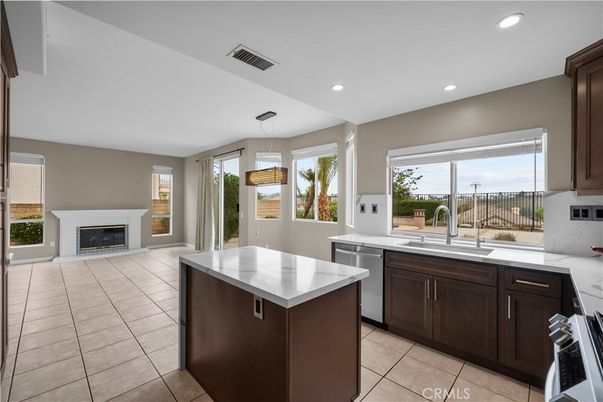 Fireplace, Interior, Kitchen, Pendant Lights, Recessed Lighting, Stainless Steel Appliances