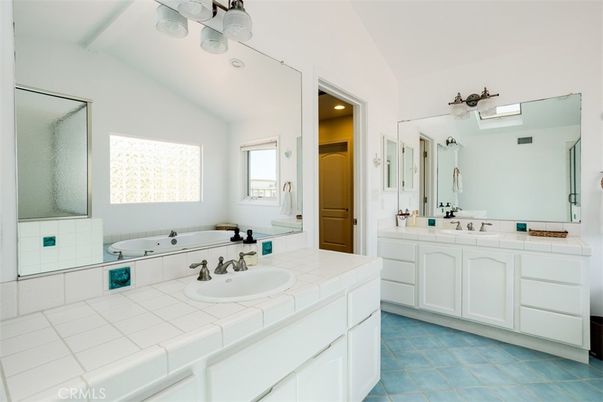 Bathroom, Dual Sink Vanities, Interior, Recessed Lighting, Tile Countertops