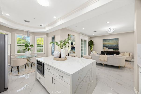 Chandelier, Dining room, Interior, Kitchen, Living room, Marble, Pendant Lights, Recessed Lighting, Stainless Steel Appliances