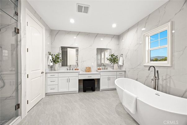 Bathroom, Dual Sink Vanities, Free Standing Baths, Glass Shower, Interior, Marble Walls, Recessed Lighting