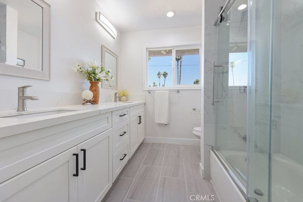 Bathroom, Dual Sink Vanities, Glass Shower, Interior, Marble Walls, Recessed Lighting