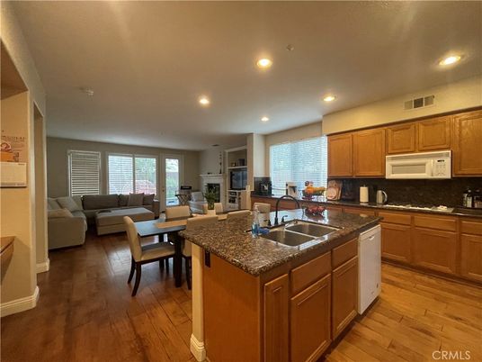 Dining room, Fireplace, Interior, Kitchen, Living room, Recessed Lighting, Wood Texture Flooring