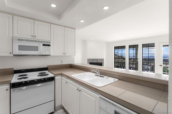 Interior, Kitchen, Recessed Lighting, Tile Countertops