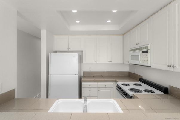 Interior, Kitchen, Recessed Lighting, Tile Countertops