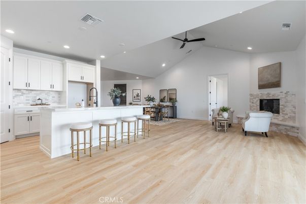 Fireplace, Interior, Kitchen, Recessed Lighting, Stone Walls, Wood Texture Flooring